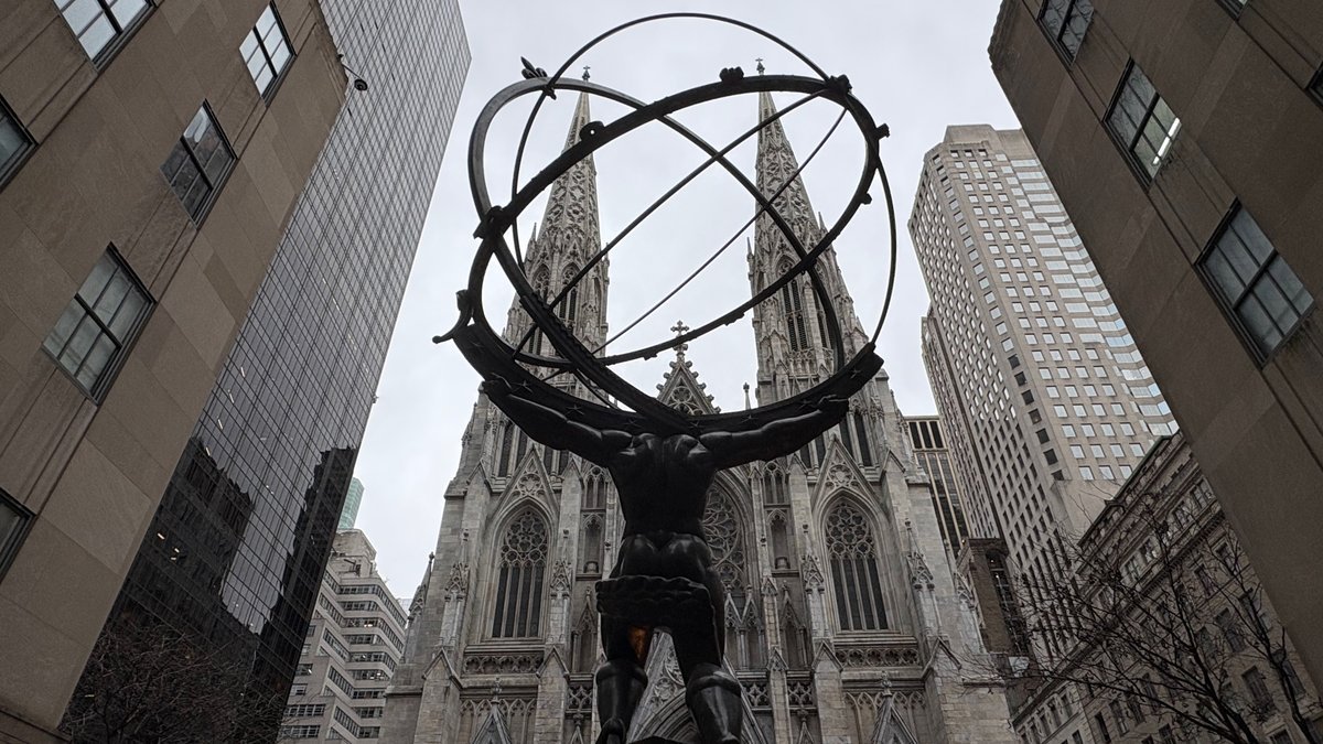 Atlas statue and St. Patrick's Cathedral architectural landmark, Midtown Manhattan historic site for day trip to Philadelphia from NYC