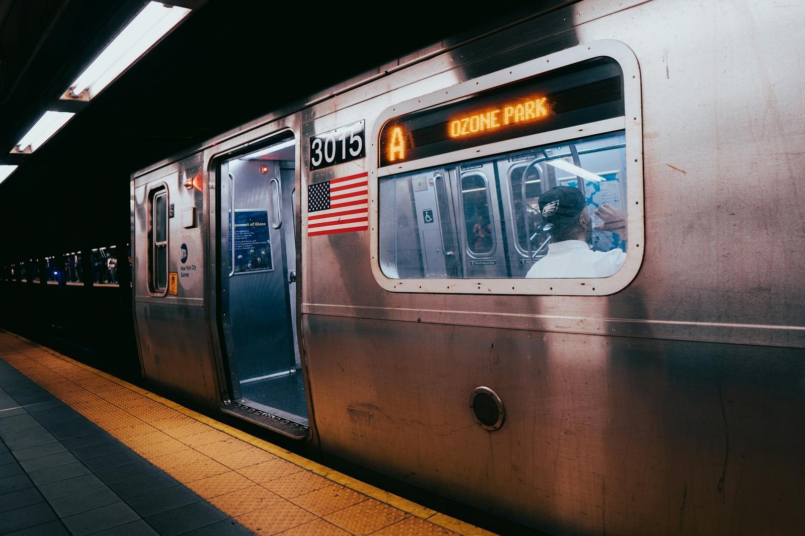 New York City A train at subway station, destination Ozone Park.