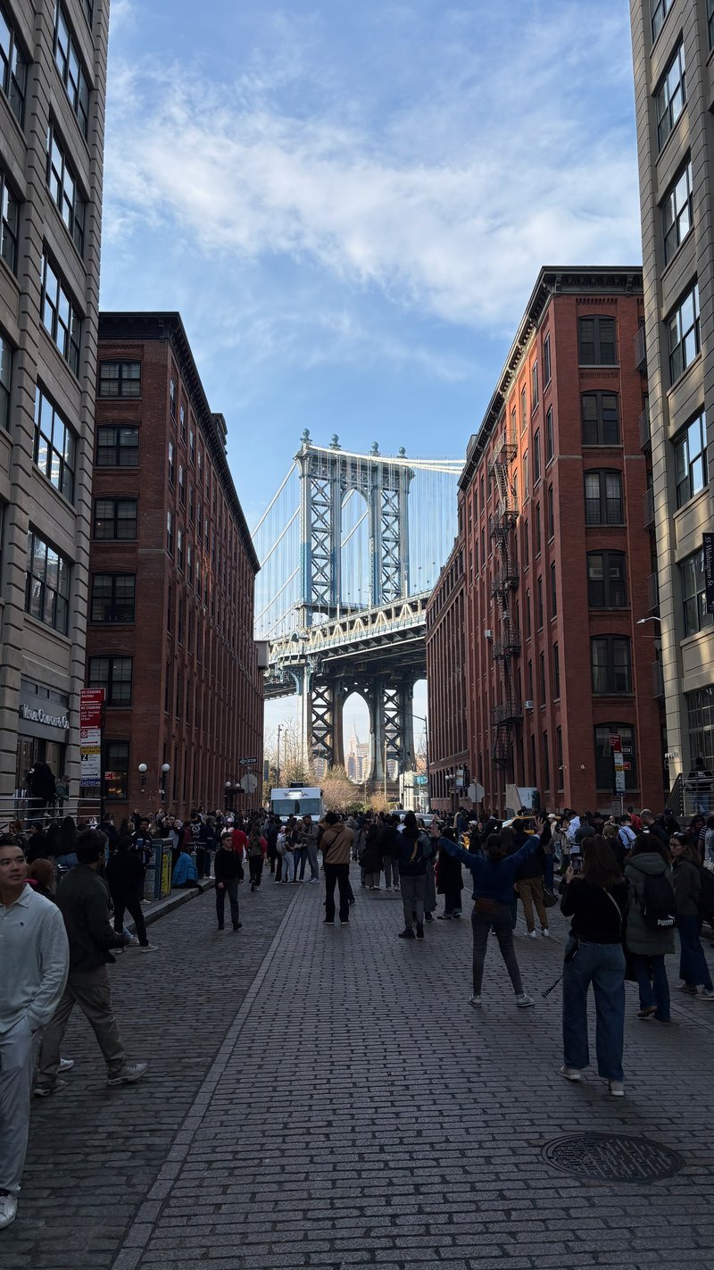Manhattan Bridge framed by brownstones on Washington Street, DUMBO Brooklyn
