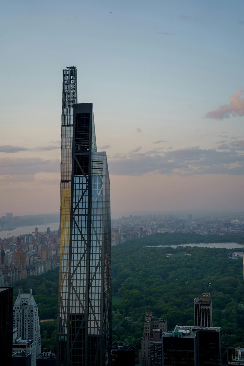 Aerial view of Central Park surrounded by Manhattan skyline