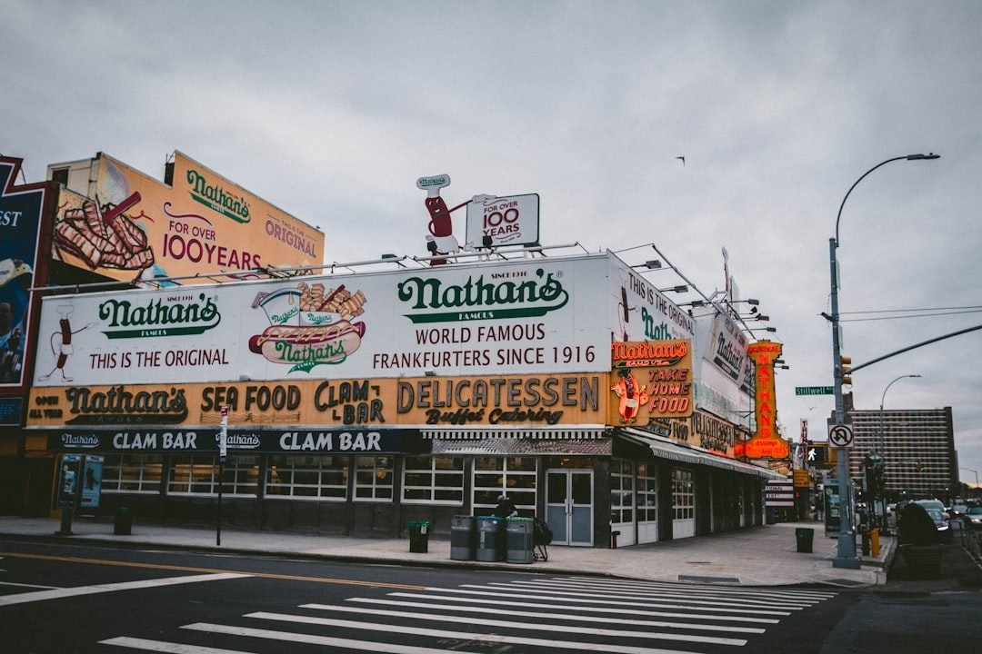 Nathan's Famous hot dog stand in Coney Island, Brooklyn, a historic NYC food landmark.
